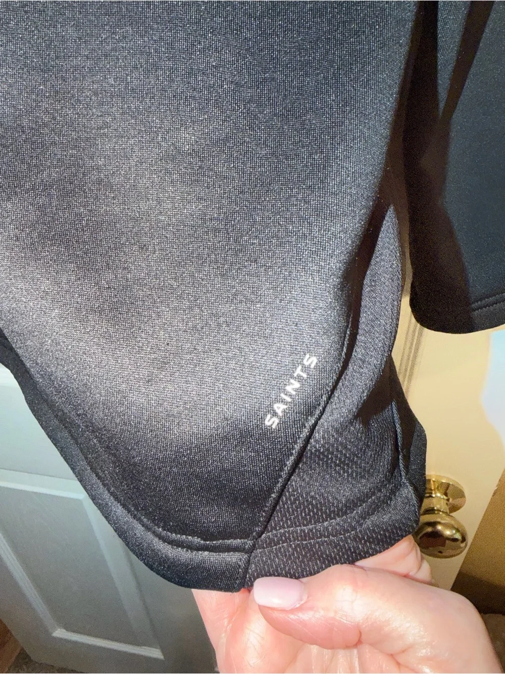 NFL Saints Black Pullover with Gold Zipper Trim